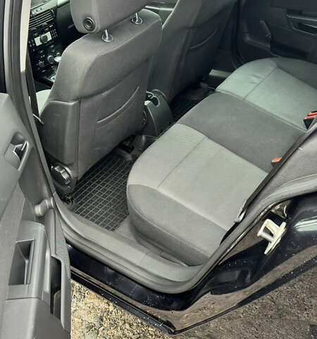 Черный Опель Астра, объемом двигателя 1.69 л и пробегом 242 тыс. км за 6200 $, фото 15 на Automoto.ua