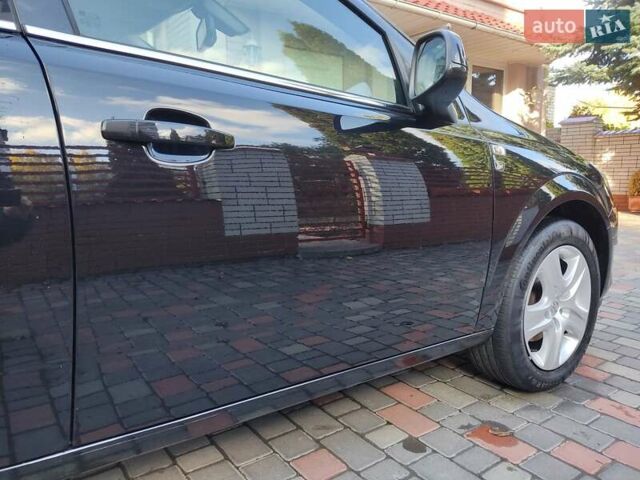 Чорний Опель Астра, об'ємом двигуна 1.4 л та пробігом 215 тис. км за 5900 $, фото 9 на Automoto.ua