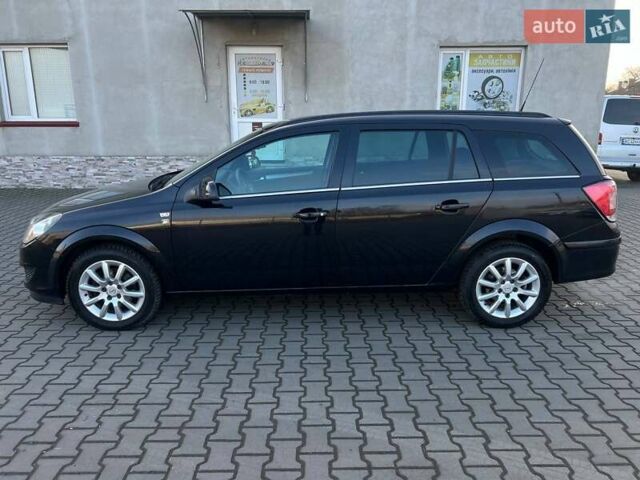 Черный Опель Астра, объемом двигателя 1.6 л и пробегом 219 тыс. км за 5600 $, фото 6 на Automoto.ua