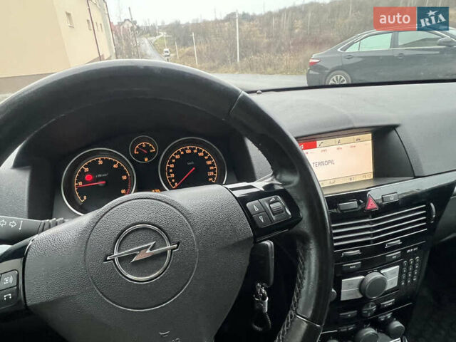 Черный Опель Астра, объемом двигателя 1.7 л и пробегом 264 тыс. км за 5799 $, фото 65 на Automoto.ua