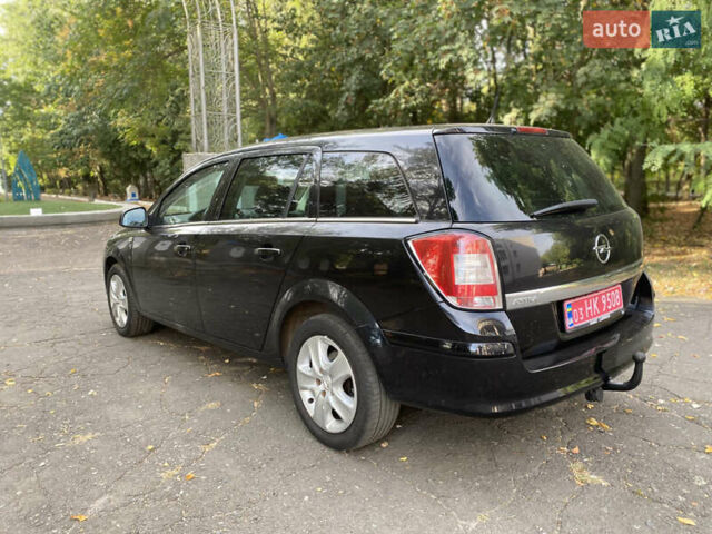 Черный Опель Астра, объемом двигателя 1.6 л и пробегом 200 тыс. км за 6400 $, фото 16 на Automoto.ua