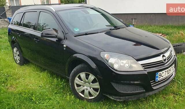 Черный Опель Астра, объемом двигателя 1.4 л и пробегом 150 тыс. км за 6100 $, фото 7 на Automoto.ua