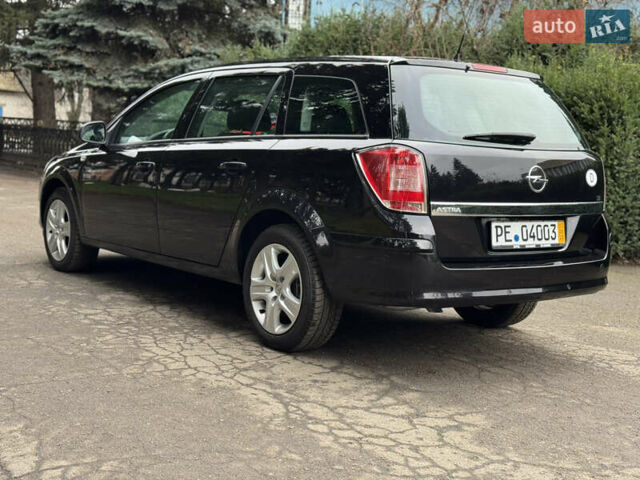 Черный Опель Астра, объемом двигателя 1.6 л и пробегом 228 тыс. км за 5750 $, фото 8 на Automoto.ua