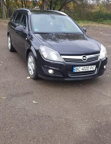 Черный Опель Астра, объемом двигателя 1.69 л и пробегом 252 тыс. км за 5600 $, фото 8 на Automoto.ua