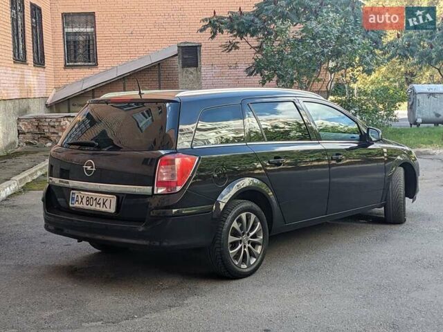 Черный Опель Астра, объемом двигателя 1.6 л и пробегом 226 тыс. км за 5600 $, фото 6 на Automoto.ua