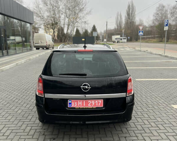 Черный Опель Астра, объемом двигателя 1.6 л и пробегом 250 тыс. км за 5600 $, фото 3 на Automoto.ua