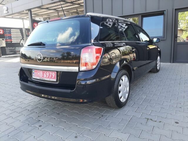 Чорний Опель Астра, об'ємом двигуна 1.6 л та пробігом 152 тис. км за 5699 $, фото 7 на Automoto.ua