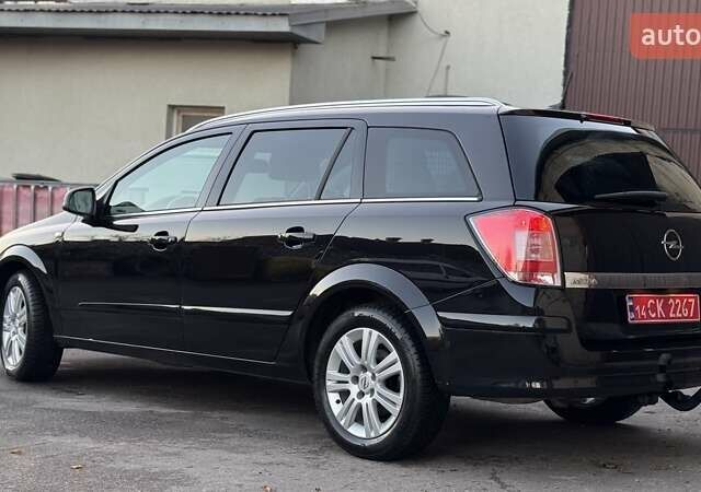 Черный Опель Астра, объемом двигателя 1.6 л и пробегом 205 тыс. км за 6150 $, фото 4 на Automoto.ua