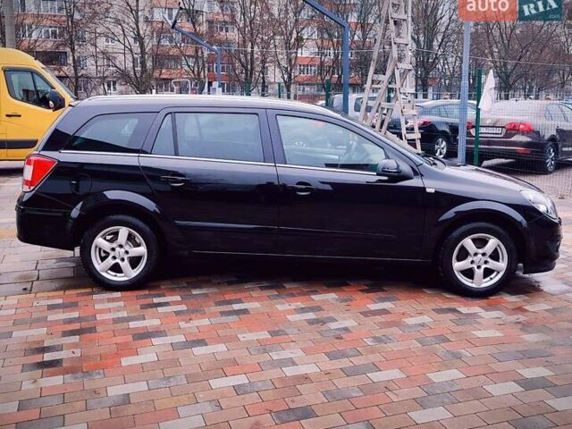 Черный Опель Астра, объемом двигателя 1.6 л и пробегом 212 тыс. км за 5750 $, фото 3 на Automoto.ua