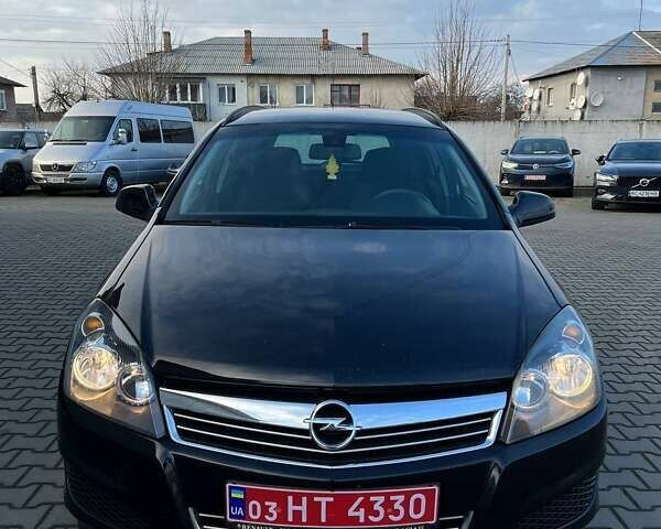 Черный Опель Астра, объемом двигателя 1.6 л и пробегом 219 тыс. км за 5600 $, фото 16 на Automoto.ua