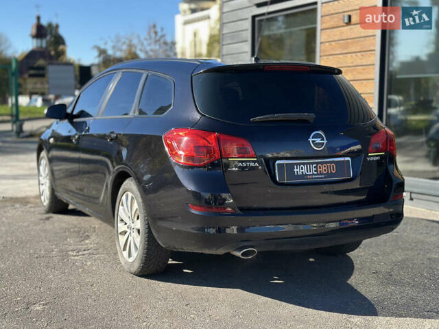 Черный Опель Астра, объемом двигателя 1.36 л и пробегом 250 тыс. км за 6200 $, фото 12 на Automoto.ua