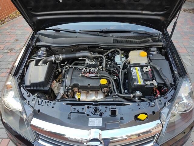 Черный Опель Астра, объемом двигателя 1.4 л и пробегом 215 тыс. км за 5900 $, фото 6 на Automoto.ua