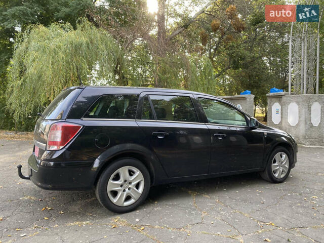 Черный Опель Астра, объемом двигателя 1.6 л и пробегом 200 тыс. км за 6400 $, фото 7 на Automoto.ua