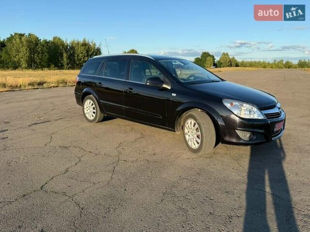 Черный Опель Астра, объемом двигателя 1.6 л и пробегом 175 тыс. км за 6300 $, фото 6 на Automoto.ua