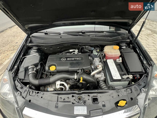 Черный Опель Астра, объемом двигателя 1.7 л и пробегом 264 тыс. км за 5799 $, фото 35 на Automoto.ua