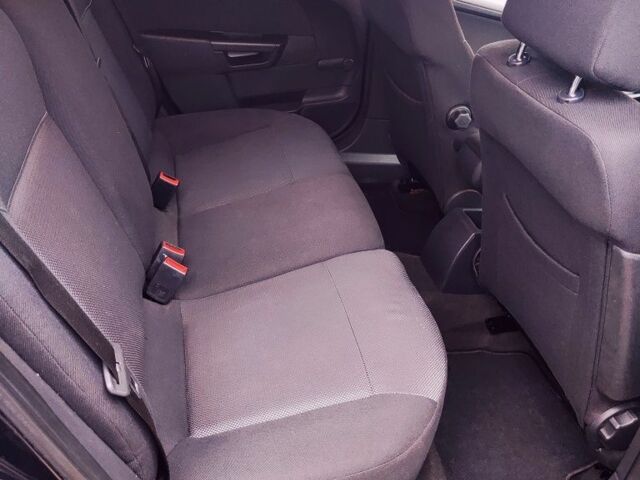 Черный Опель Астра, объемом двигателя 1.6 л и пробегом 237 тыс. км за 5350 $, фото 23 на Automoto.ua