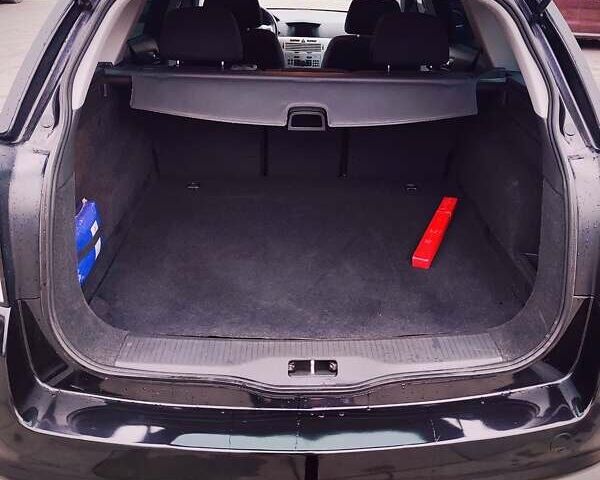 Черный Опель Астра, объемом двигателя 1.6 л и пробегом 237 тыс. км за 5350 $, фото 26 на Automoto.ua