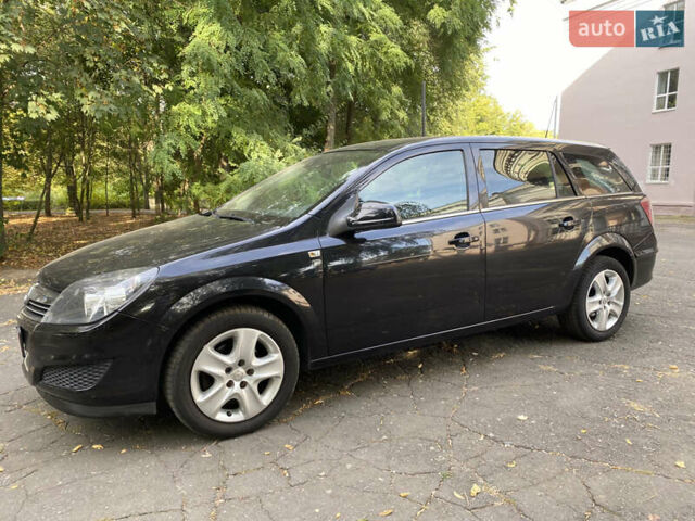 Черный Опель Астра, объемом двигателя 1.6 л и пробегом 200 тыс. км за 6400 $, фото 1 на Automoto.ua
