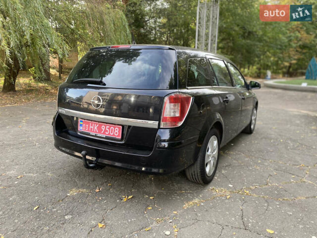 Черный Опель Астра, объемом двигателя 1.6 л и пробегом 200 тыс. км за 6400 $, фото 10 на Automoto.ua