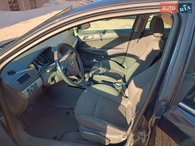 Чорний Опель Астра, об'ємом двигуна 1.69 л та пробігом 324 тис. км за 5700 $, фото 1 на Automoto.ua