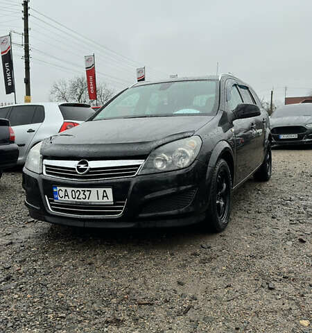 Черный Опель Астра, объемом двигателя 1.69 л и пробегом 242 тыс. км за 6200 $, фото 1 на Automoto.ua