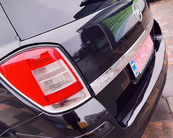 Черный Опель Астра, объемом двигателя 1.6 л и пробегом 212 тыс. км за 5750 $, фото 5 на Automoto.ua