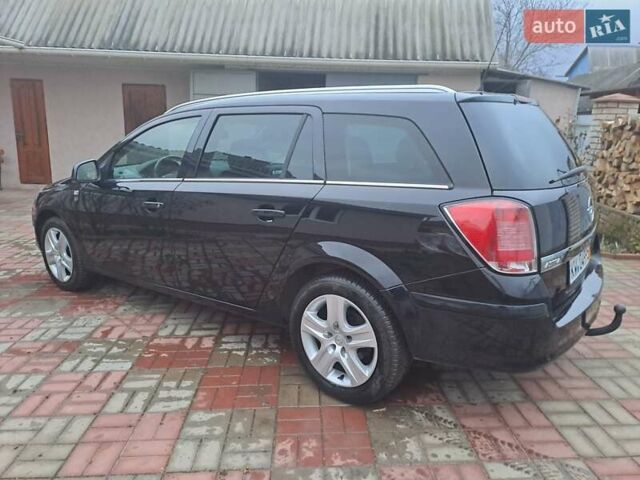 Черный Опель Астра, объемом двигателя 1.6 л и пробегом 209 тыс. км за 5800 $, фото 6 на Automoto.ua