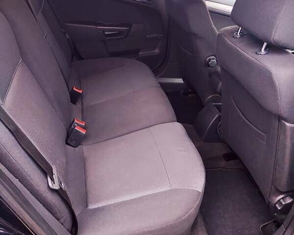 Черный Опель Астра, объемом двигателя 1.6 л и пробегом 237 тыс. км за 5350 $, фото 40 на Automoto.ua