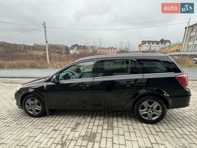 Черный Опель Астра, объемом двигателя 1.7 л и пробегом 264 тыс. км за 5799 $, фото 14 на Automoto.ua