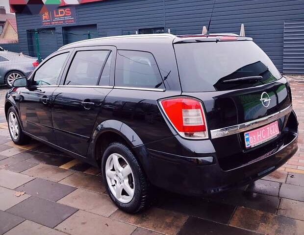 Черный Опель Астра, объемом двигателя 1.6 л и пробегом 212 тыс. км за 5750 $, фото 7 на Automoto.ua