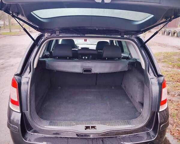 Черный Опель Астра, объемом двигателя 1.6 л и пробегом 212 тыс. км за 5750 $, фото 17 на Automoto.ua