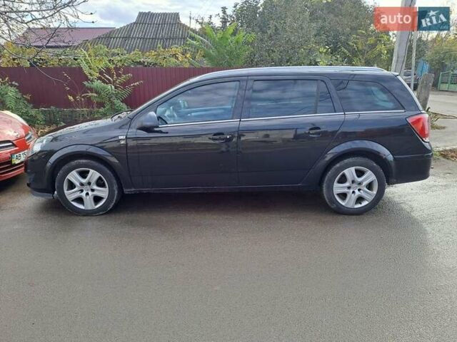 Черный Опель Астра, объемом двигателя 1.6 л и пробегом 209 тыс. км за 5100 $, фото 1 на Automoto.ua