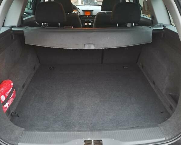 Черный Опель Астра, объемом двигателя 1.6 л и пробегом 209 тыс. км за 5800 $, фото 12 на Automoto.ua