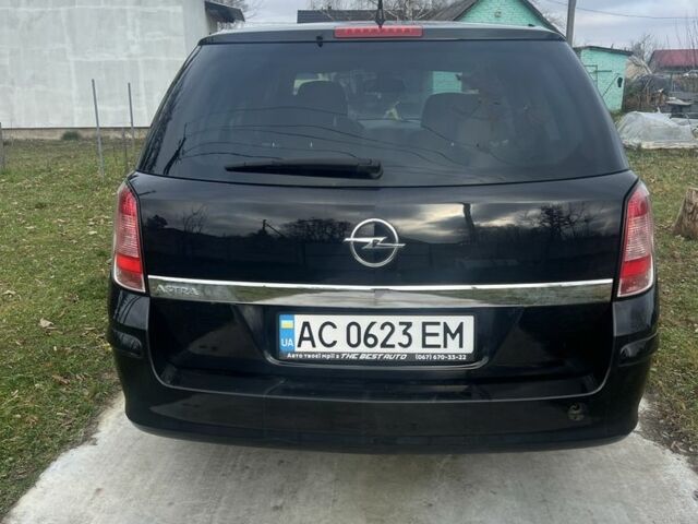 Черный Опель Астра, объемом двигателя 1.6 л и пробегом 319 тыс. км за 5200 $, фото 3 на Automoto.ua