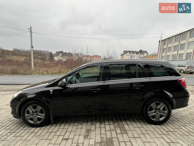 Черный Опель Астра, объемом двигателя 1.7 л и пробегом 264 тыс. км за 5799 $, фото 12 на Automoto.ua