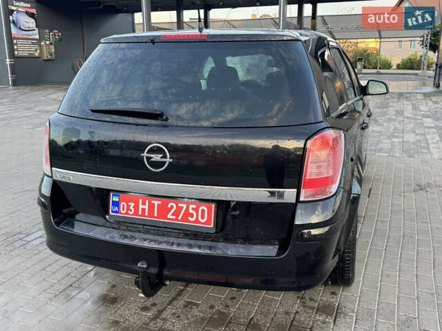 Черный Опель Астра, объемом двигателя 1.6 л и пробегом 219 тыс. км за 5500 $, фото 3 на Automoto.ua