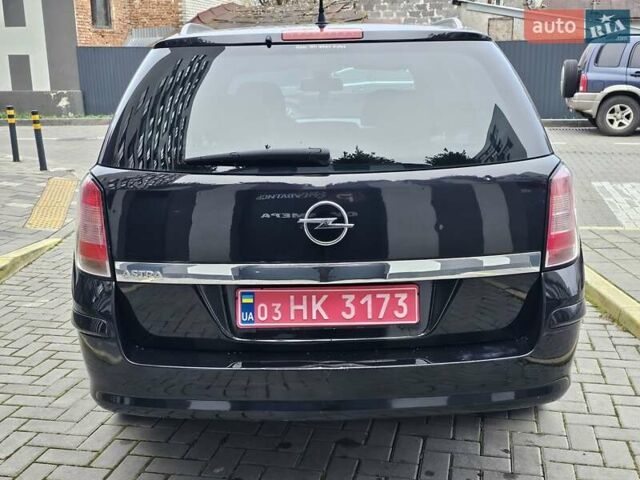 Чорний Опель Астра, об'ємом двигуна 1.6 л та пробігом 240 тис. км за 6290 $, фото 1 на Automoto.ua