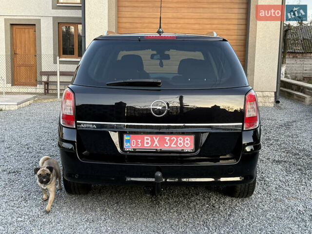 Черный Опель Астра, объемом двигателя 1.6 л и пробегом 252 тыс. км за 6400 $, фото 85 на Automoto.ua