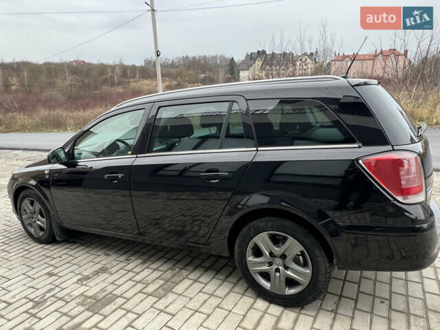 Черный Опель Астра, объемом двигателя 1.7 л и пробегом 264 тыс. км за 5799 $, фото 15 на Automoto.ua