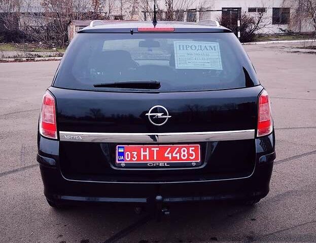 Черный Опель Астра, объемом двигателя 1.6 л и пробегом 172 тыс. км за 5350 $, фото 6 на Automoto.ua