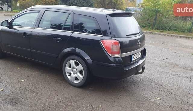 Черный Опель Астра, объемом двигателя 1.69 л и пробегом 252 тыс. км за 5600 $, фото 11 на Automoto.ua