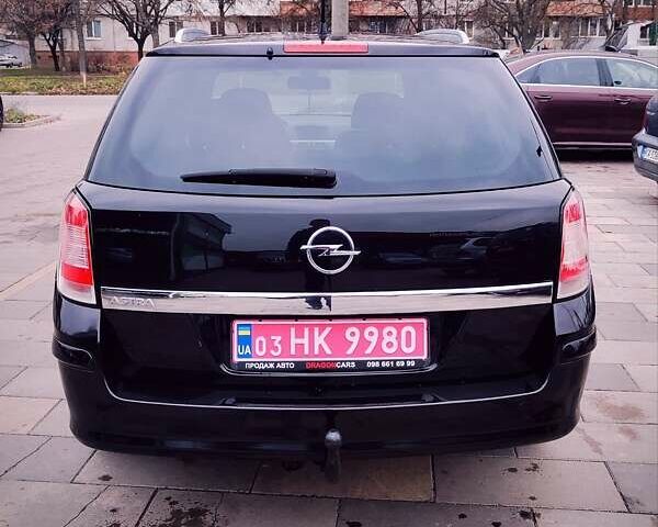 Черный Опель Астра, объемом двигателя 1.6 л и пробегом 237 тыс. км за 5350 $, фото 6 на Automoto.ua