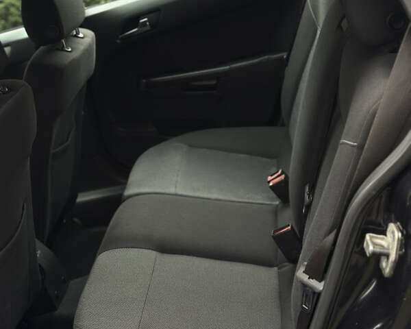 Черный Опель Астра, объемом двигателя 1.6 л и пробегом 228 тыс. км за 5750 $, фото 16 на Automoto.ua