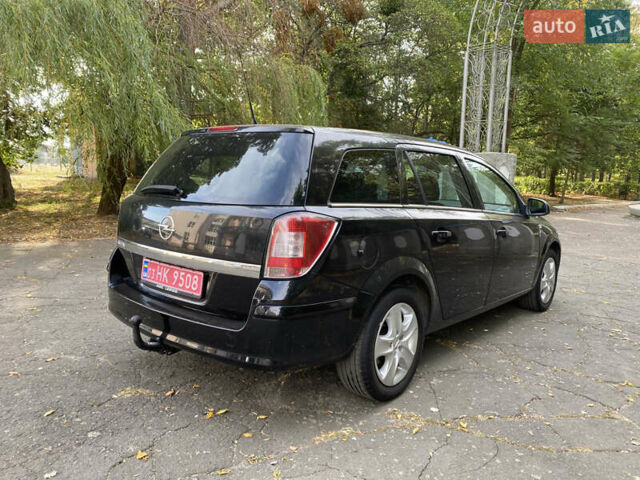 Черный Опель Астра, объемом двигателя 1.6 л и пробегом 200 тыс. км за 6400 $, фото 8 на Automoto.ua