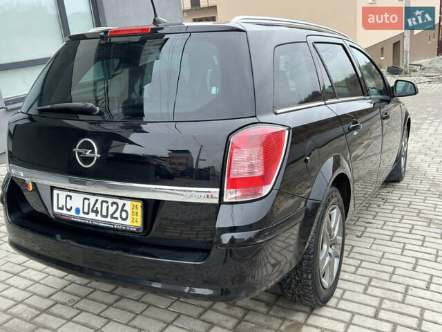 Черный Опель Астра, объемом двигателя 1.7 л и пробегом 264 тыс. км за 5799 $, фото 24 на Automoto.ua