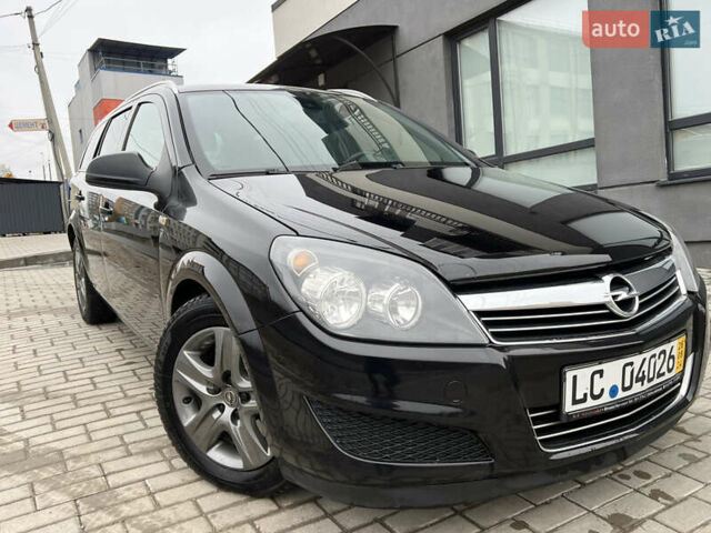 Черный Опель Астра, объемом двигателя 1.7 л и пробегом 264 тыс. км за 5799 $, фото 29 на Automoto.ua