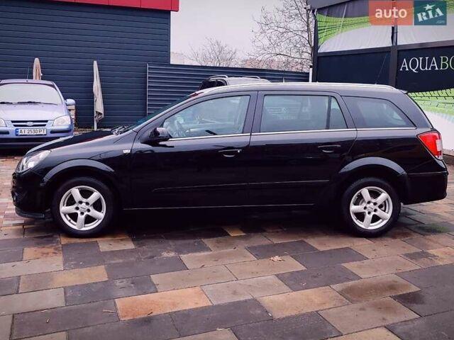 Черный Опель Астра, объемом двигателя 1.6 л и пробегом 212 тыс. км за 5750 $, фото 1 на Automoto.ua