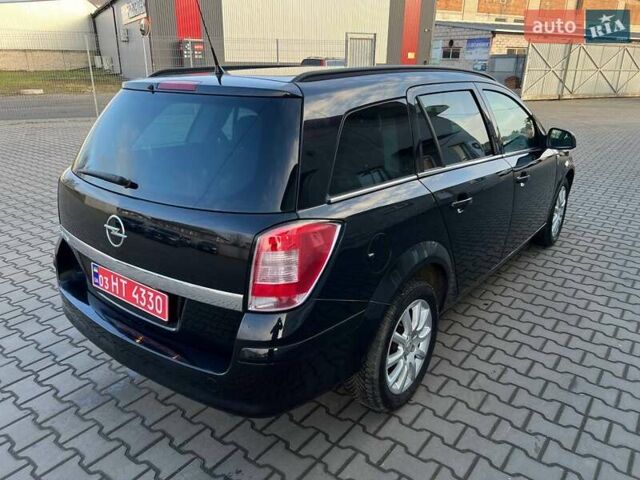 Черный Опель Астра, объемом двигателя 1.6 л и пробегом 219 тыс. км за 5600 $, фото 5 на Automoto.ua