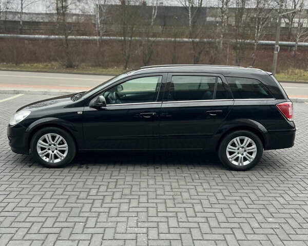 Черный Опель Астра, объемом двигателя 1.6 л и пробегом 250 тыс. км за 5600 $, фото 4 на Automoto.ua