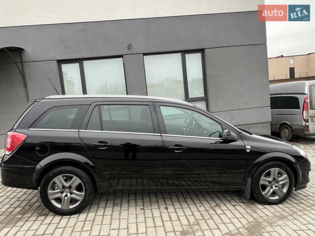 Черный Опель Астра, объемом двигателя 1.7 л и пробегом 264 тыс. км за 5799 $, фото 26 на Automoto.ua